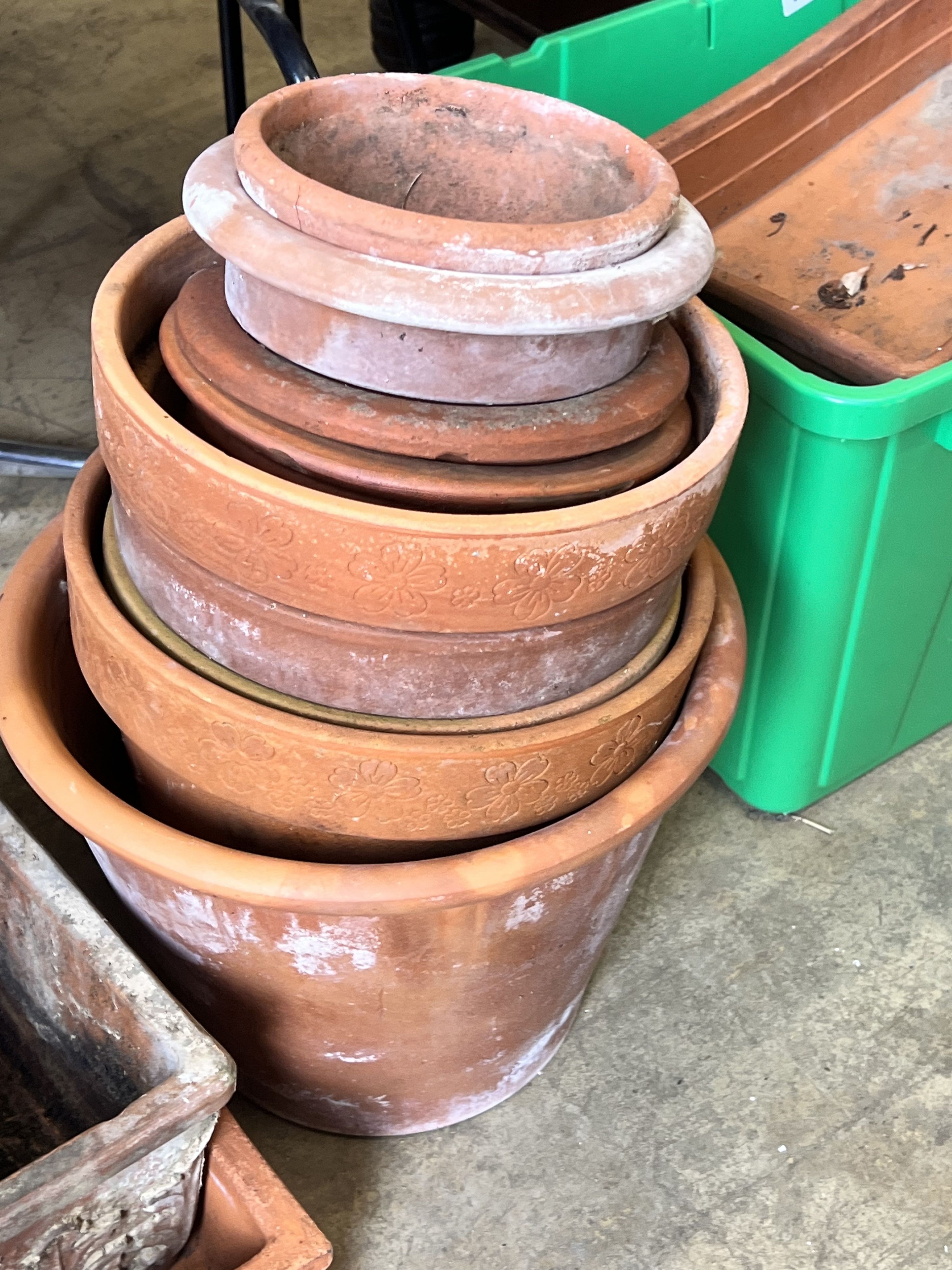 Approximately fifty assorted terracotta garden pots